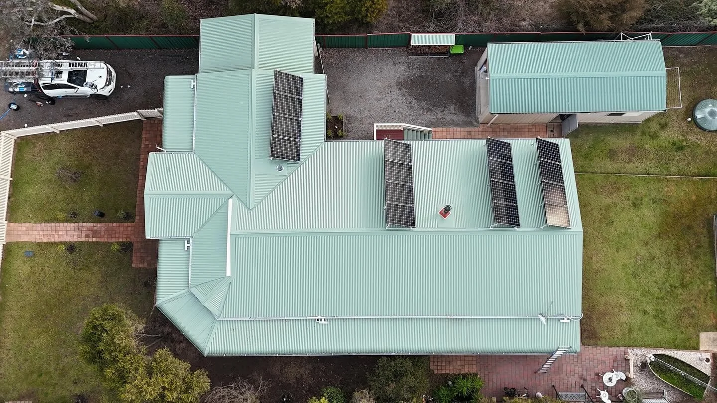 Flat roof membrane seam repair and drainage evaluation on an Ocala FL property
